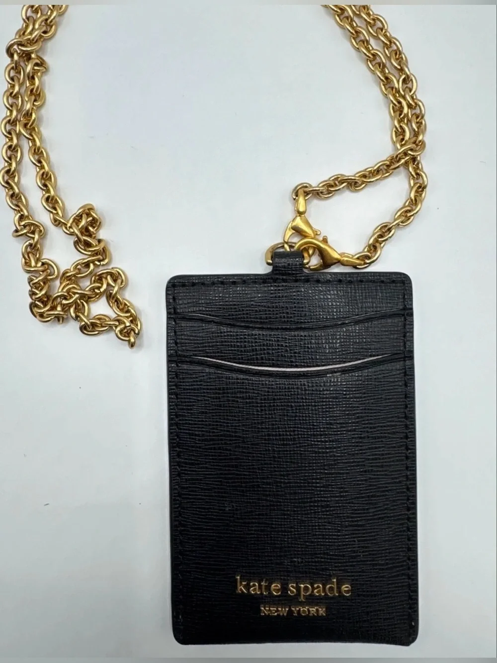 Kate Spade lanyard is holder black gold chain